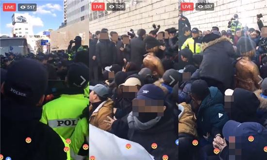 부산 일본영사관 앞 소녀상 설치…철거하려는 경찰에 맞서 연좌농성