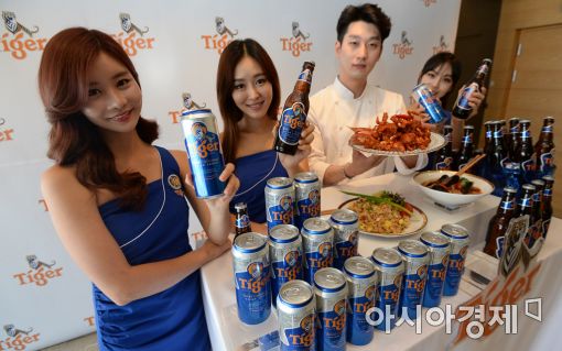 [맥주 전성시대①]열대야 식히는 시원한 한 잔…수입맥주, 생수 매출도 꺾었다