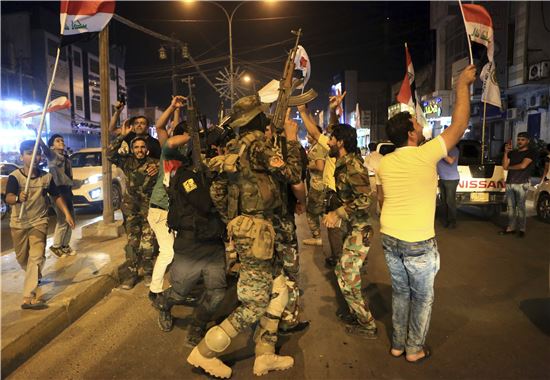 지난 7월, 이라크군에 탈환된 IS 최대 거점도시 모술의 탈환 당시 모습(사진=AP연합뉴스)