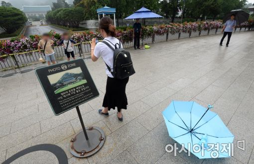 [포토]'우산은 잠시 내려놓고…'