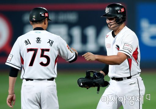 [포토]김동욱, '행운의 안타로 1타점'