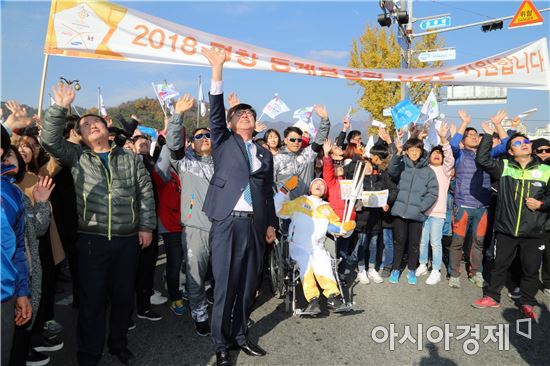 장흥토요시장, 우드랜드 밝힌 평창동계올림픽 성화