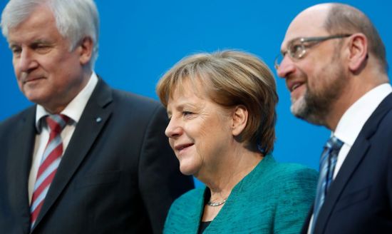 앙겔라 메르켈 독일 총리(가운데)와 마르틴 슐츠 사민당 대표(오른쪽) [이미지출처=로이터연합뉴스]