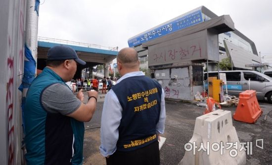 [포토] 철거 반대하는 구시장 상인들