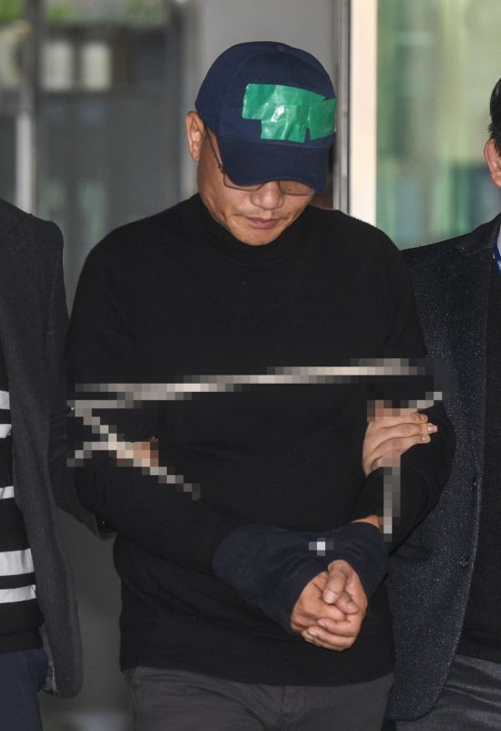 [포토] 입 꾹 다문 양진호 회장