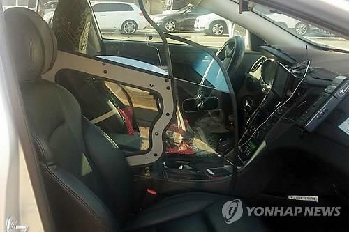 한 택시에 설치된 보호격벽.사진=연합뉴스