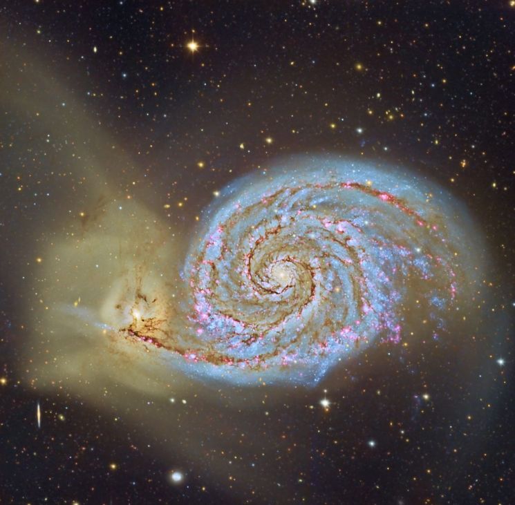 대표적인 충돌 은하인 부자은하, M51의 모습.