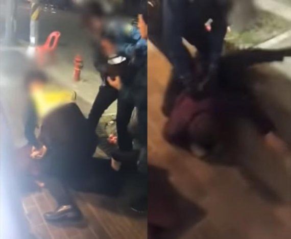 서울 구로구 구로동의 한 식당앞에서 술에 취한 중년 남성 2명이 경찰 앞에서 난동을 부리는 모습이 담긴 영상이 공개됐다/사진=구로경찰서