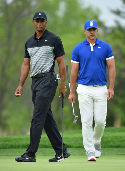 마스터스 챔프 타이거 우즈(왼쪽)와 PGA챔피언십 우승자 브룩스 켑카가 119번째 US오픈에서 격돌한다.