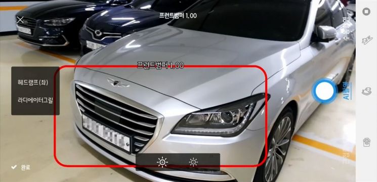 한화시스템이 개발한 'AOS 알파' 모바일 앱의 경량AI로 실시간 사고 부위를 인식하는 모습
