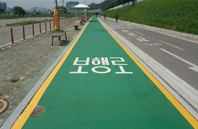 오금교~희망교 2.4km 구간 확장 및 재포장