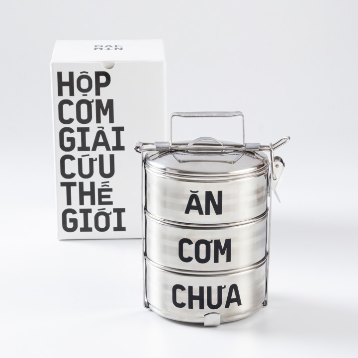 The 3-tier lunchbox from BAEMIN, popular in Vietnam. The sentence and meaning change depending on the stacking order.