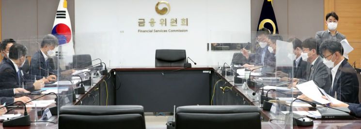 금융위, 마지못해 가상화폐 책임지지만...여전한 곁눈질