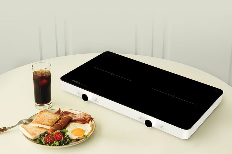 건강가전 종합 브랜드 웰스는 주방 공간 편의성을 높인 ‘웰스 전기레인지 2구 인덕션’을 출시했다고 17일 밝혔다. 사진제공 = 웰스