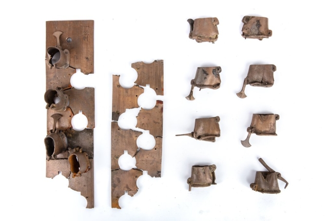 A bronze artifact presumed to be a 'Jujeon,' a component of a water clock. (Photo by Cultural Heritage Administration)