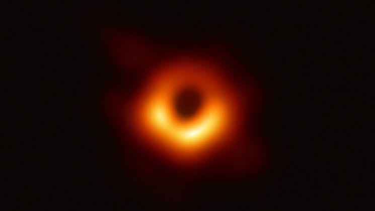 The Event Horizon Telescope captured this image of the supermassive black hole in the center of the galaxy M87. (Image credit: EHT Collaboration)