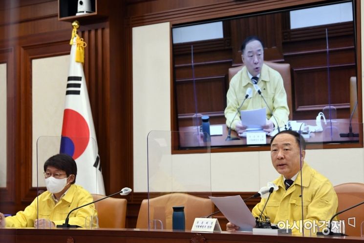 홍남기 "다주택자 양도세 완화 없다"…여당과 충돌