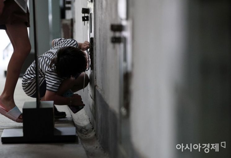 [포토] 옥사를 바라보는 아이의 시선