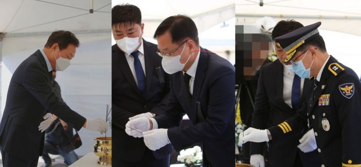 박완수 경남도지사(왼쪽부터), 홍남표 창원특례시장, 김병수 경남경찰청장이 이태원 참사 사망자를 위한 분향소를 찾아 향을 피우고 있다. / 이세령 기자 ryeong@