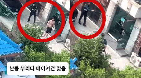 흉기난동을 부리던 외국인 불법 체류자를 남녀경찰관이 2인1조로 검거하고 있다. [사진출처=온라인 커뮤니티 '루리웹']