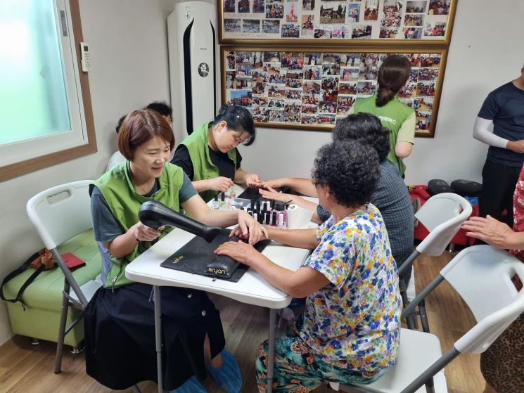 찾아가는 전남행복버스, 광양 진월 중산서 봉사활동 