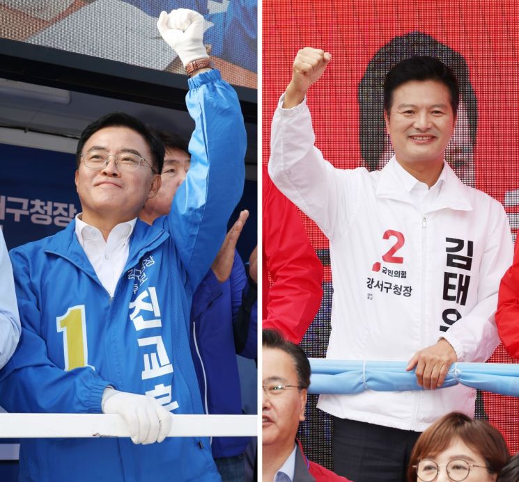 진교훈 더불어민주당(왼쪽), 김태우 국민의힘 강서구청장 보궐선거 후보가 지난 3일 각각 서울 강서구 방화사거리와 화곡역 교차로에서 선거 유세를 하고 있다. [사진=연합뉴스]