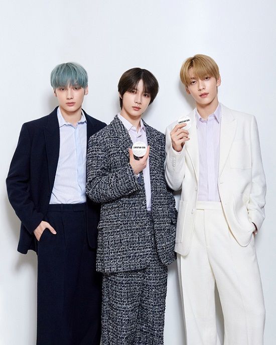 [Tomorrow X Together's Hueningkai, Beomgyu, and Soobin experiencing Dior Le Balm (from left)]