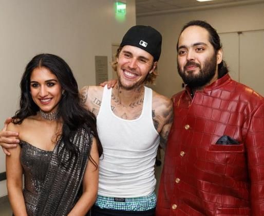 저스틴 비버가 신랑, 신부와 함께 찍은 사진 [이미지출처=인스타그램 캡처]