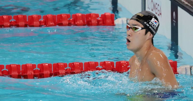 '페이스 조절?' 김우민 예선 7위로 400m 결선 진출[파리올림픽]