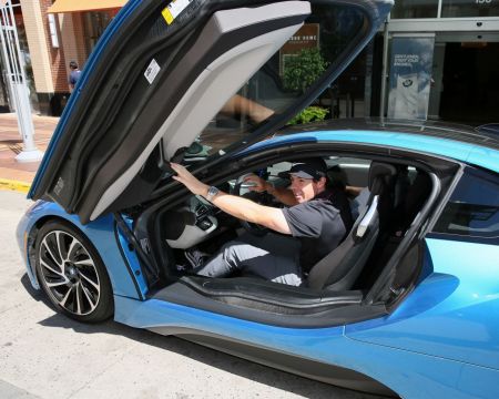 Rory McIlroy is seen riding the BMW i8. (Photo provided by BMW Group)