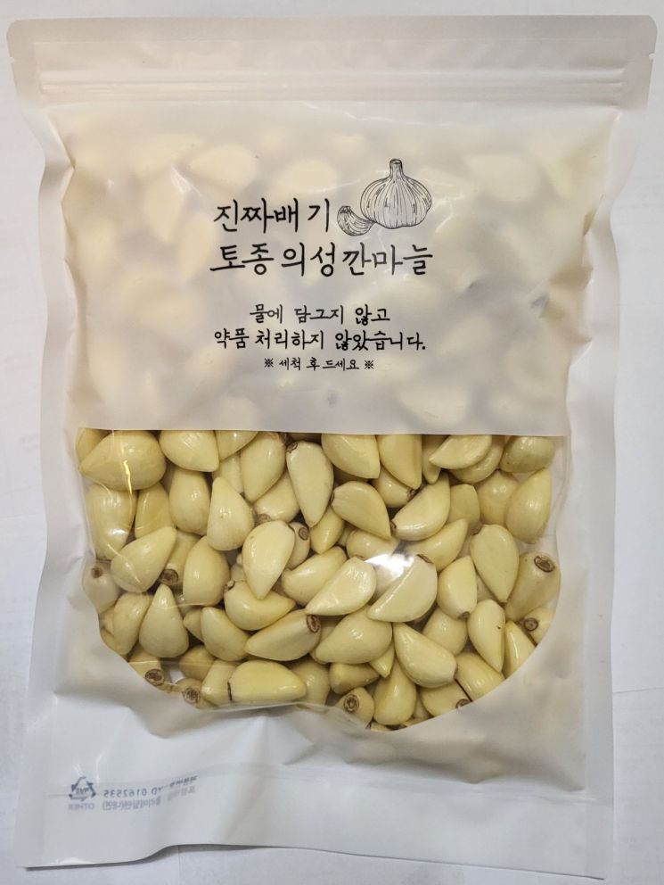 우수마을기업 한톨에서 생산한 깐마늘.