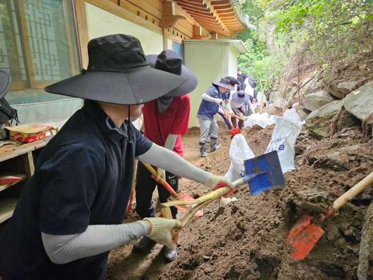 코트라, 수해 복구 자원봉사 및 성금 기부