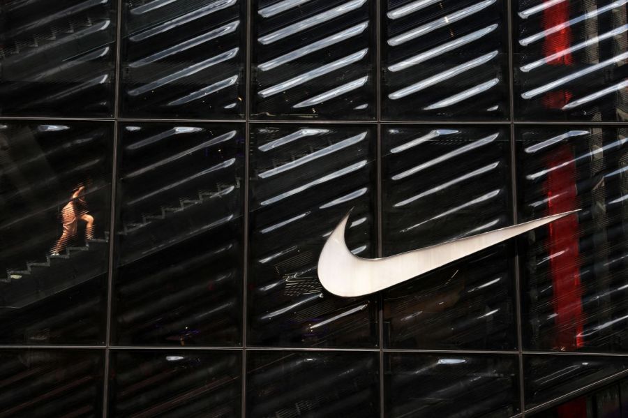 A woman is entering the Nike flagship store Innovation House NYC on 5th Avenue in New York City, USA. Photo by Reuters Yonhap News