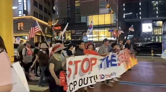 Anti-China protesters are marching in Myeongdong Street, Seoul, shouting "China Out." Owl My God China documentary YouTube capture