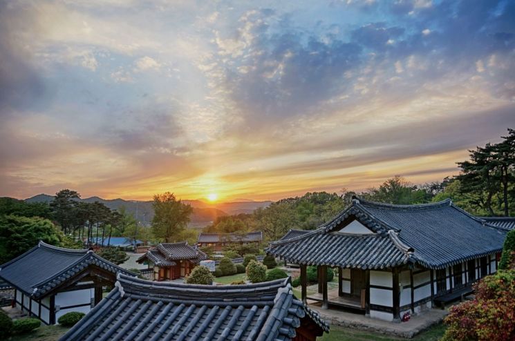 A serene view of Wolbong Seowon in Gwangsan District with the sunset settling behind the quiet Seowon. Provided by Gwangju City