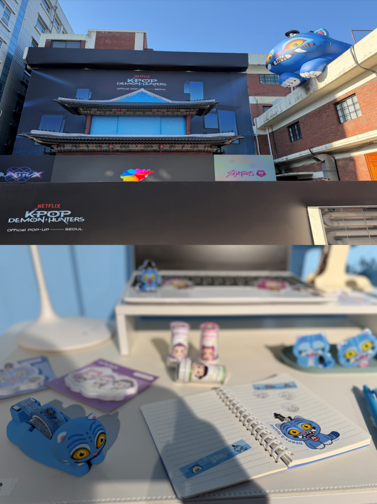 팝업 스토어 전경(위)과 케데헌 속 호랑이 캐릭터 '더피'를 테마로 한 굿즈. 김보경 기자