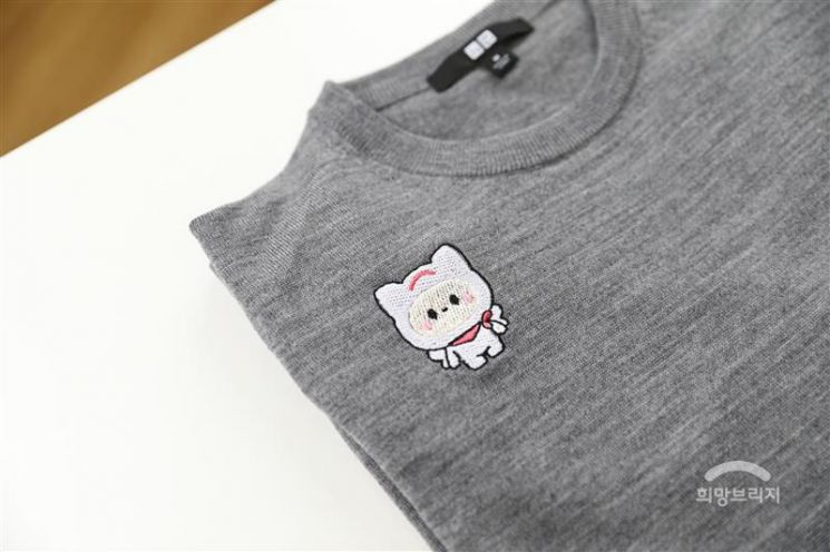 희망브리지-유니클로, 캐릭터 '희망프렌즈' 자수 디자인 선봬