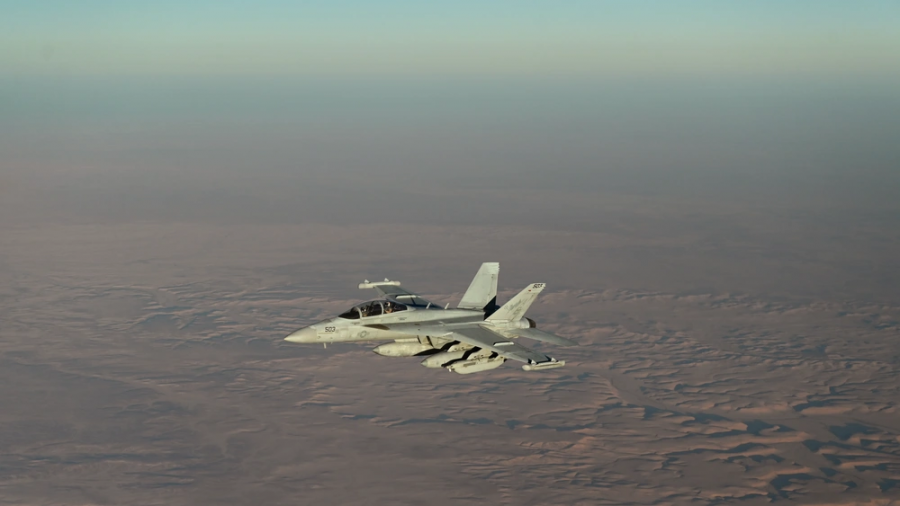 The EA-18G Growler electronic warfare aircraft is flying to carry out its mission. The electronic warfare aircraft is regarded as a key asset for disabling enemy radar and command and control networks ahead of air raids and special forces deployments.