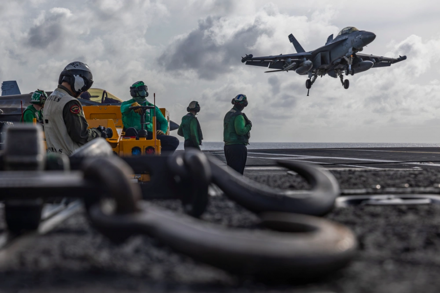 An EA-18G Growler electronic warfare aircraft is approaching the flight deck of an aircraft carrier. In modern warfare, electronic warfare aircraft are considered a leading force that determines the success or failure of mission commencement. Photo by U.S. Department of Defense (DVIDS)