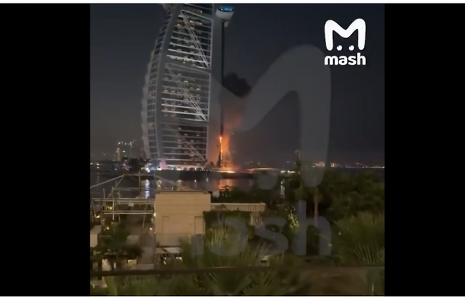 Missile debris falling in Dubai causing a fire. Screenshot from social media (SNS).