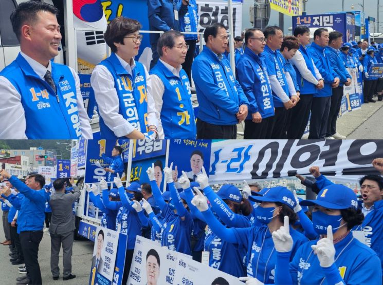 6·3 지방선거의 공식 선거운동이 시작된 21일 오전, 전남 완도군 완도 중앙시장 앞 거리는 더불어민주당의 파란색 물결로 가득 찼다. 이준경 기자