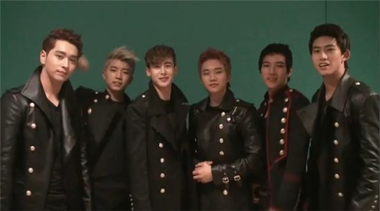 2PM celebrating 1,000 days since their debut. [Capture of 2PM's official YouTube website]