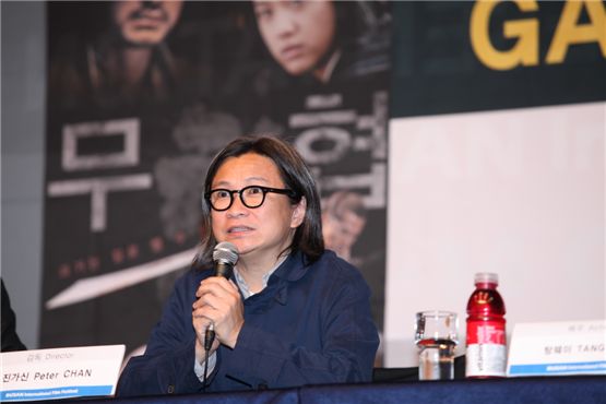 Chinese director Peter Chan speaks at a press conference for his film "Wu Xia" held at the ongoing 16th Busan International Film Festival in Busan, South Korea on October 9, 2011. [&Credit]