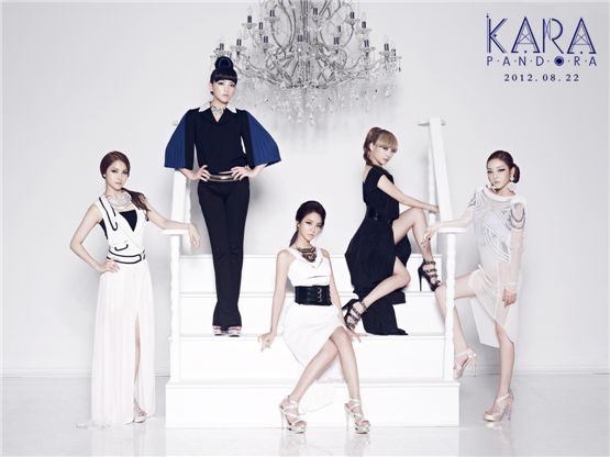 KARA's members Park Gyu-lee (left), Kang Ji-young (second to left), Han Seung-yeon (center), Nicole (second to right) and Gu Hara (right) are posing like beautiful goddesses, donned in navy and blue outfits, on the cover photo for their fifth mini-album "PANDORA," which will be released on Augst 22, 2012. [DSP Media]