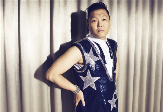 PSY poses in front of the camera before opening his sold-out concert, "Summer Stand," held at Seoul's Jamsil Sports Complex Stadium on August 11, 2011. [Chae Ki-won/10Asia]