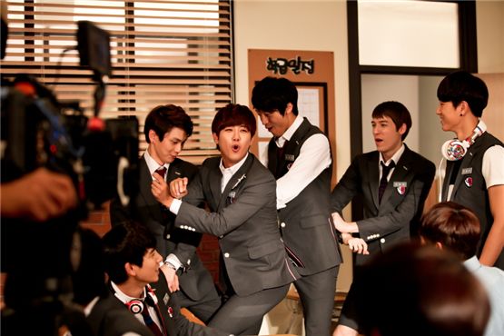 Kwanghee of ZE:A (second to left) shows PSY's signature horseback riding dance on the set of SBS "For You in Full Blossoms," located in Gwangju, Gyeonggi Province, South Korea on September 21, 2012. [3HW]