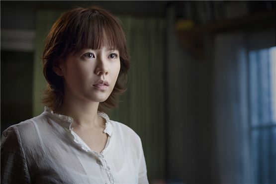 Korean actress Son Ye-jin poses in a still-shot from "Blood Ties" [tentative title] set to hit local theaters in the first half of 2013. [CJ Entertainment]