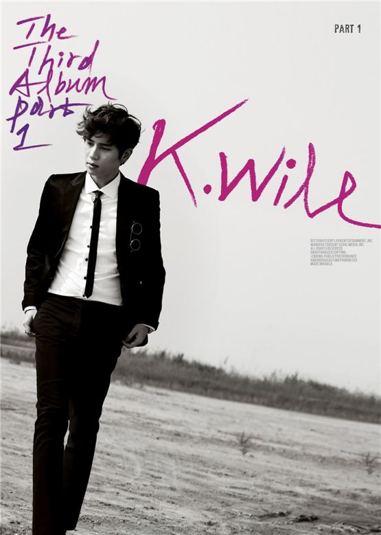 Korean solo artist K.will poses in a simple black suit in the cover photo of his third full-length album "The Third Album Part. 1," revealed on October 11, 2012. [Starship Entertainment]