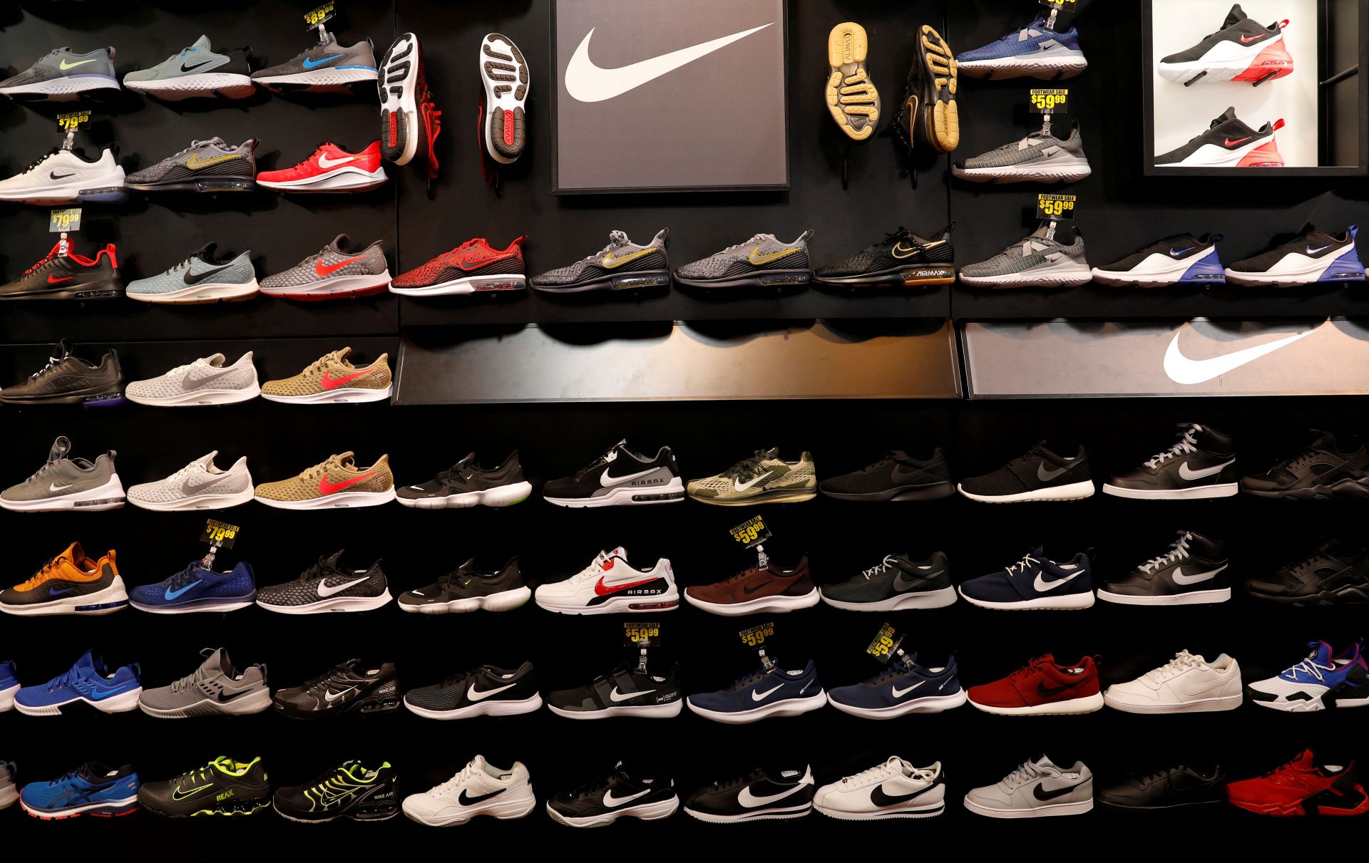 Nike shoes are displayed at a sporting goods store in New York, USA. Photo by Reuters Yonhap News