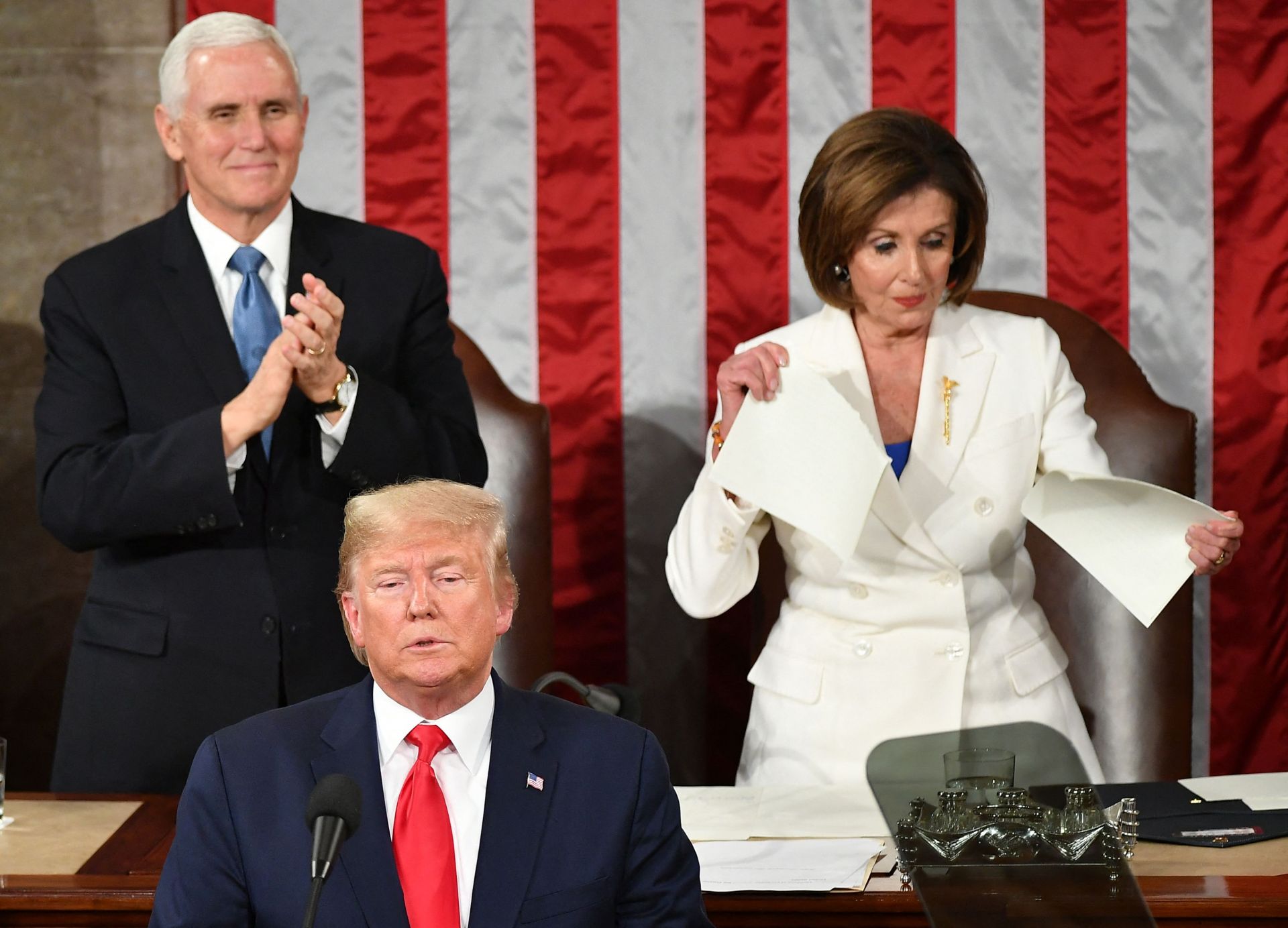 In February 2020, Nancy Pelosi (top row, right), then Speaker of the U.S. House of Representatives, is seen tearing up President Donald Trump's speech during his State of the Union address. Photo by AFP